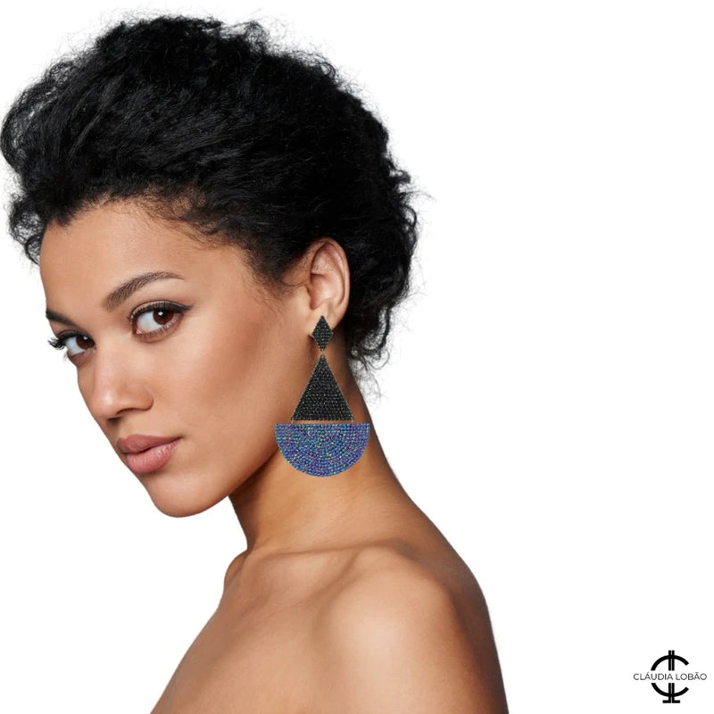 Image of beautiful model wearing large hand applied crystal earrings. Clicking on image directs you to the all Crystals section