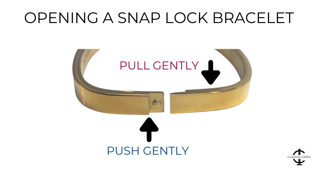 instruction on opening a snap lock bracelet - pull gently in opposing directions.
